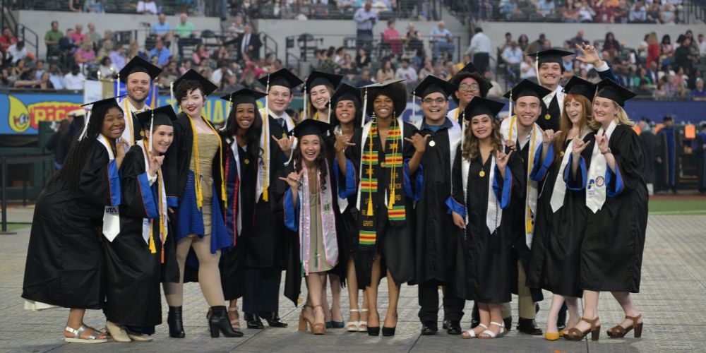 A group of students posing at UTA