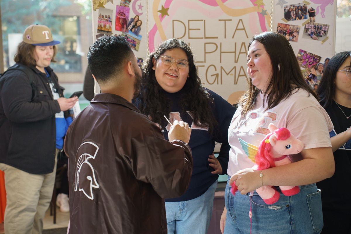 Students interacting during the Spring 2025 Maverick Activity Fair 