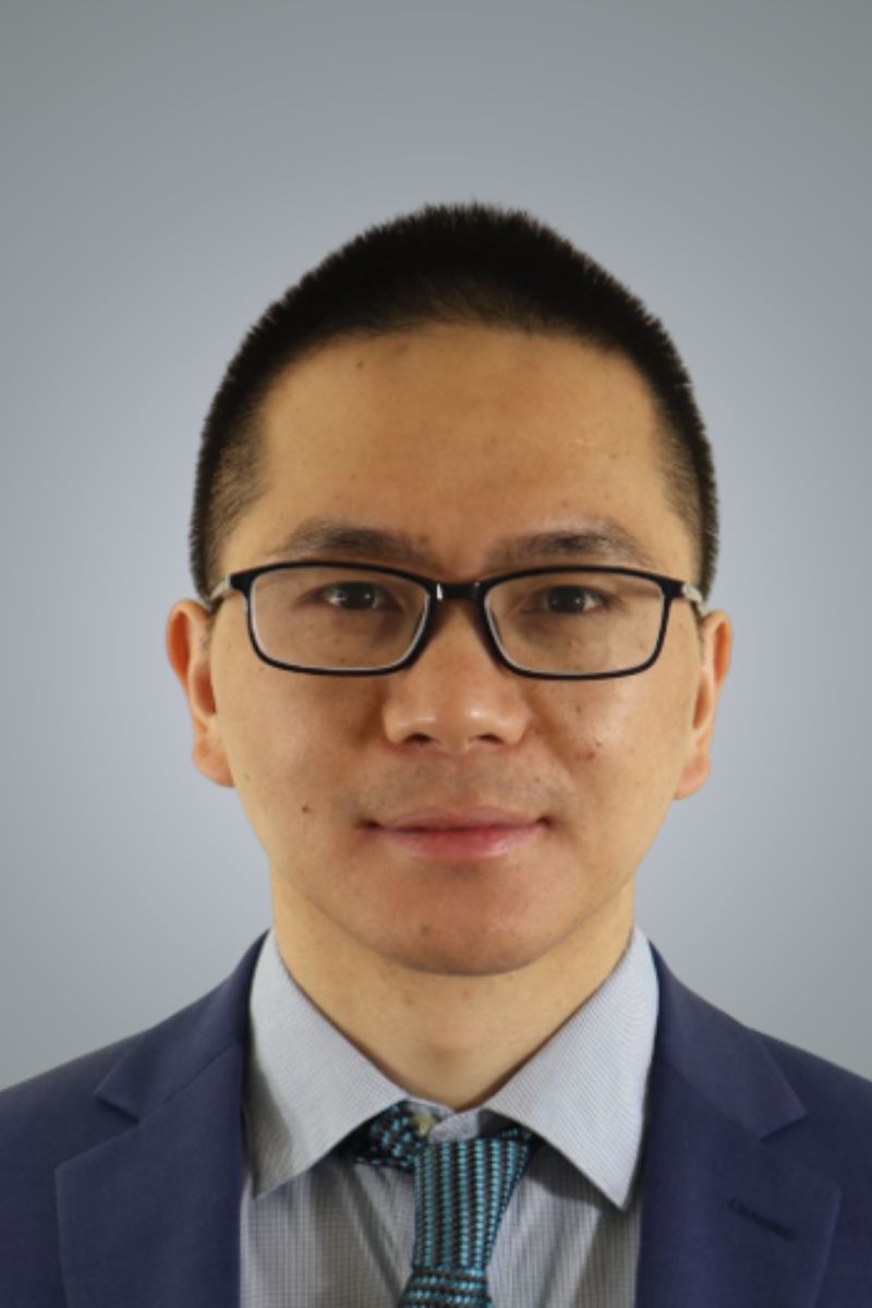 Image shows a headshot of Jinzhu Yu
