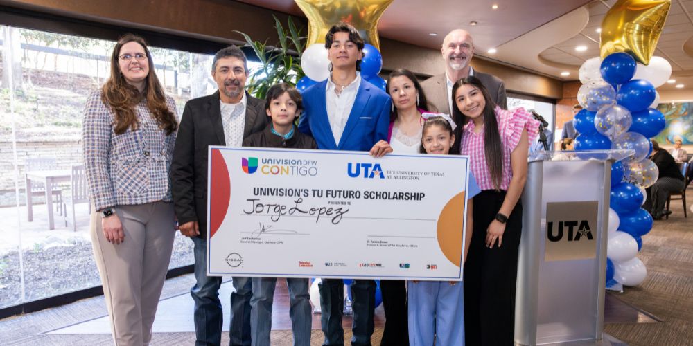 President Jennifer Cowley, Jorge Lopez and his family, and Mark Masepohl