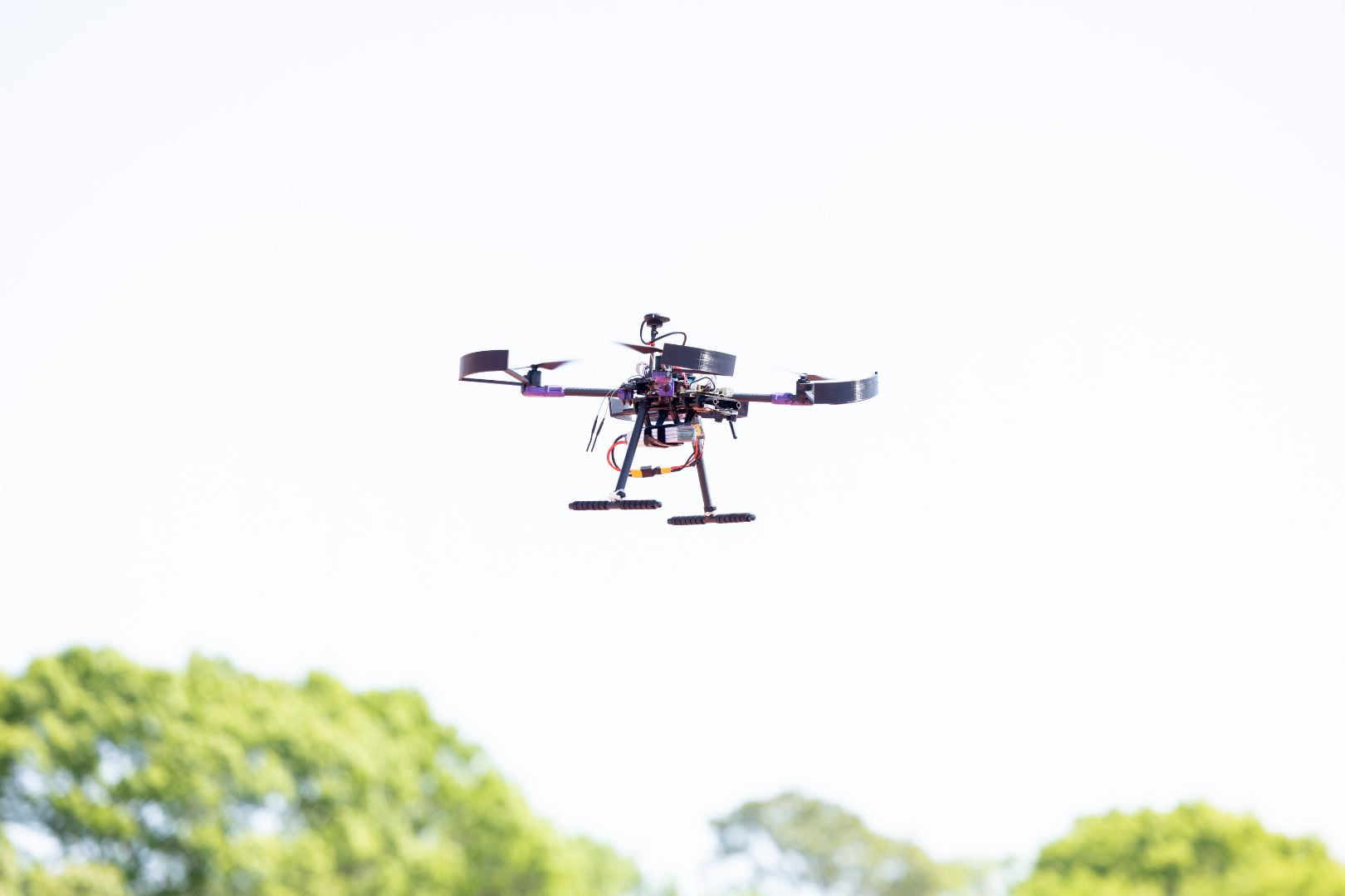 Image shows a drone in the air