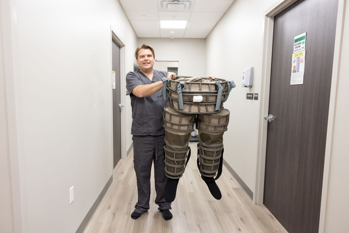 UTA researcher Michael Nelson shows off the patent-pending lower body negative pressure pants