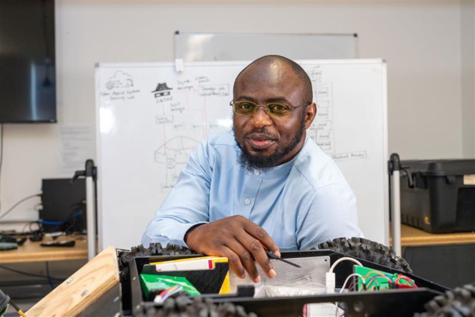 Image shows Dr. Habeeb Olufowobi in his lab 