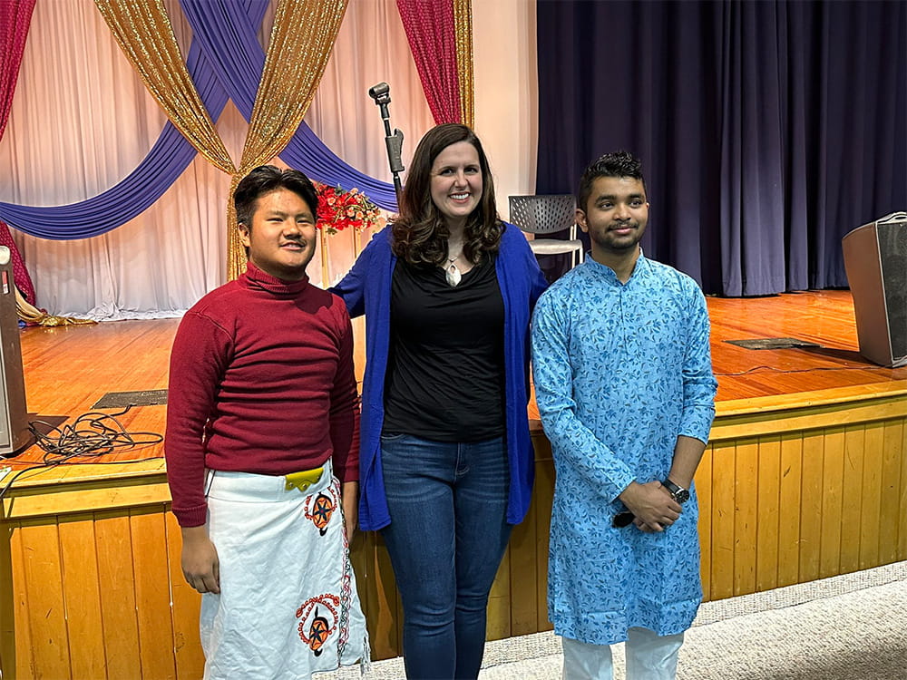 President Cowley with students at Nepali Night