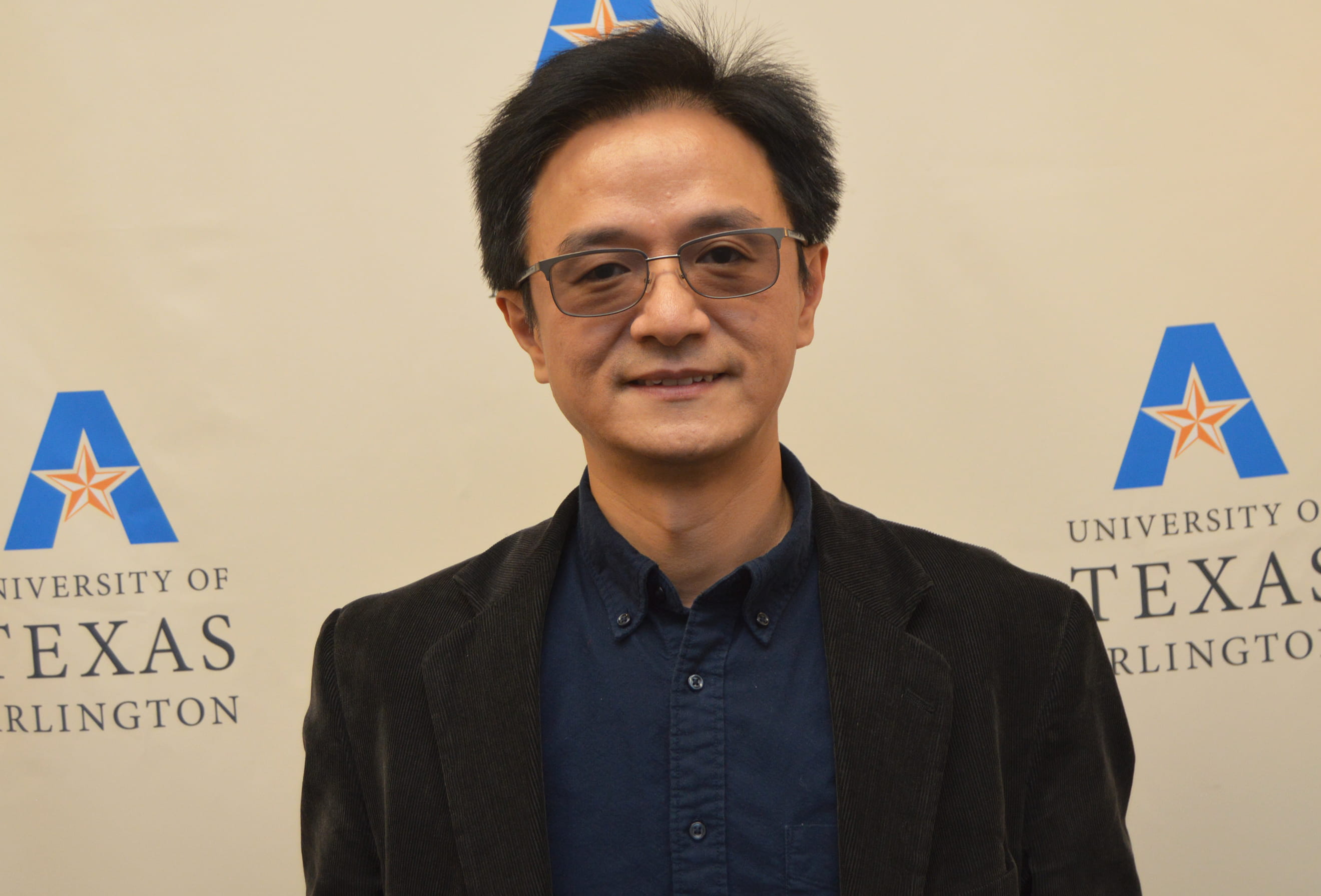 Photo of Mingwu Jin, UTA associate professor of physics,