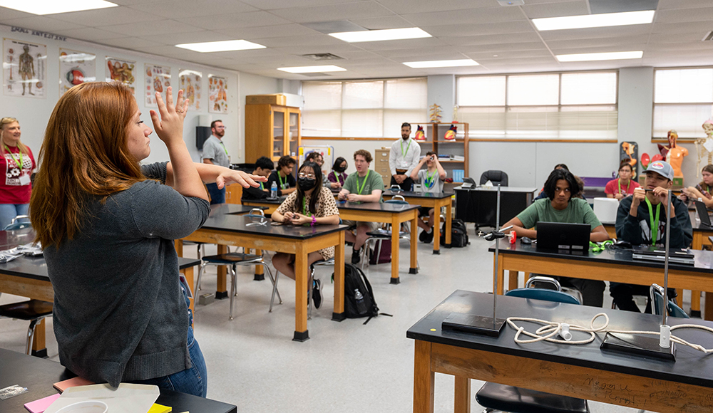 Amanda Benson teaches a class during a STEM workshop at UTA.