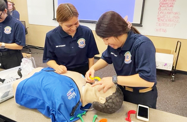 Students practice during an EMT class at UTA in September. Photo by Sheila Elliott.