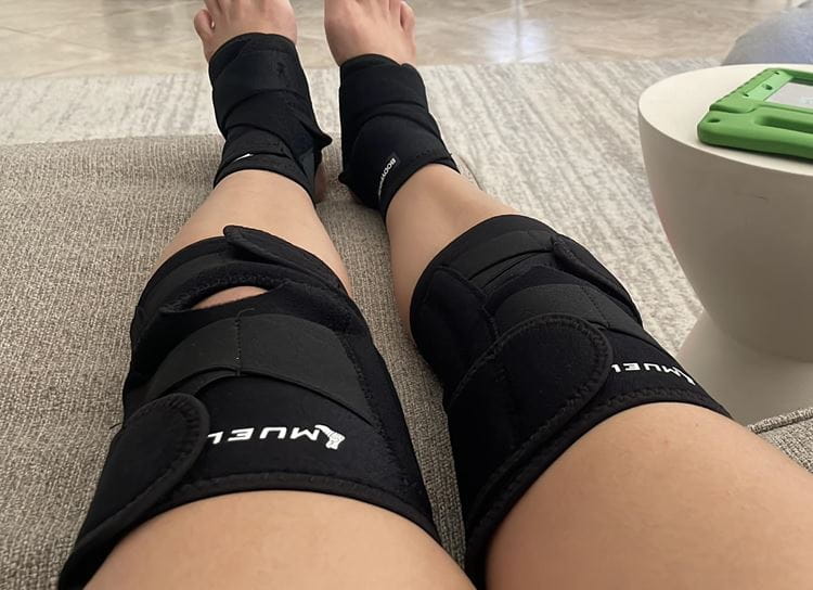 Picture of someone legs with knee braces on