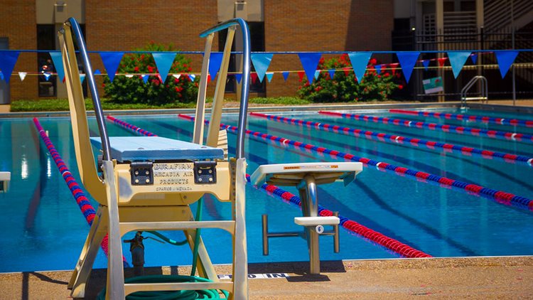 Outdoor pool with diving board