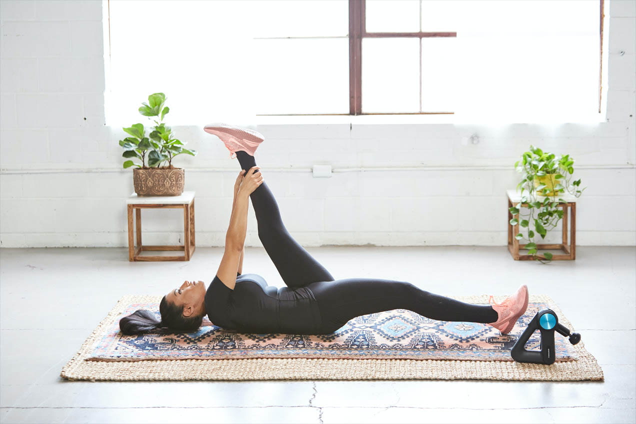 Girl stretching in a room ready for a home workout