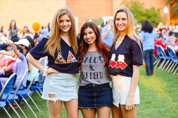 Delta Delta Delta members at an event outside