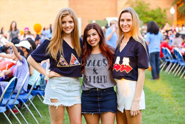 Delta Delta Delta members at an event outside