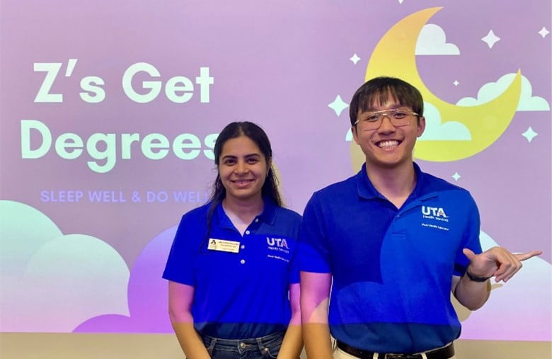Peer Health Educators posing during a "Z's Get Degrees" workshop presentation 