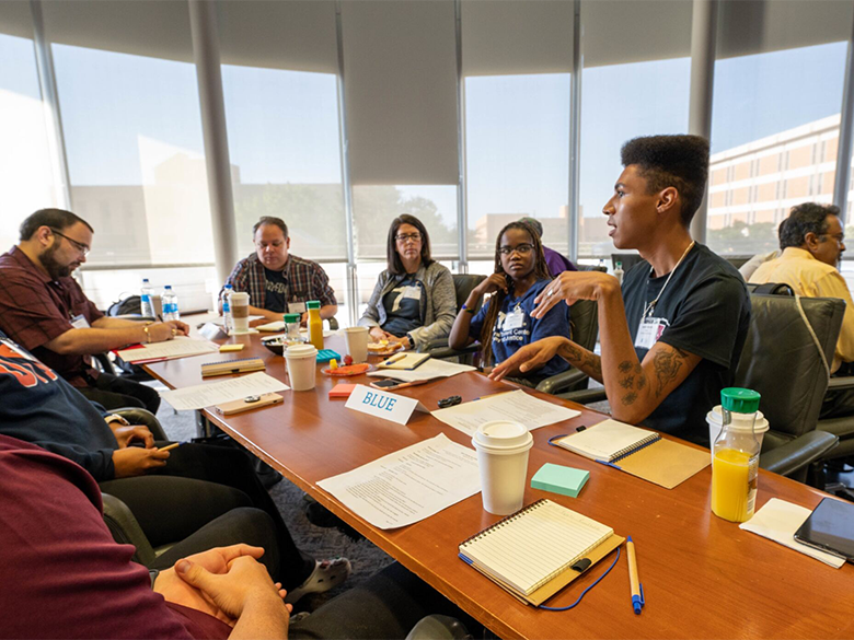 Staff engaging in discussion