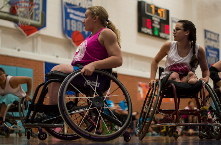 Two campers paying close attention to the game