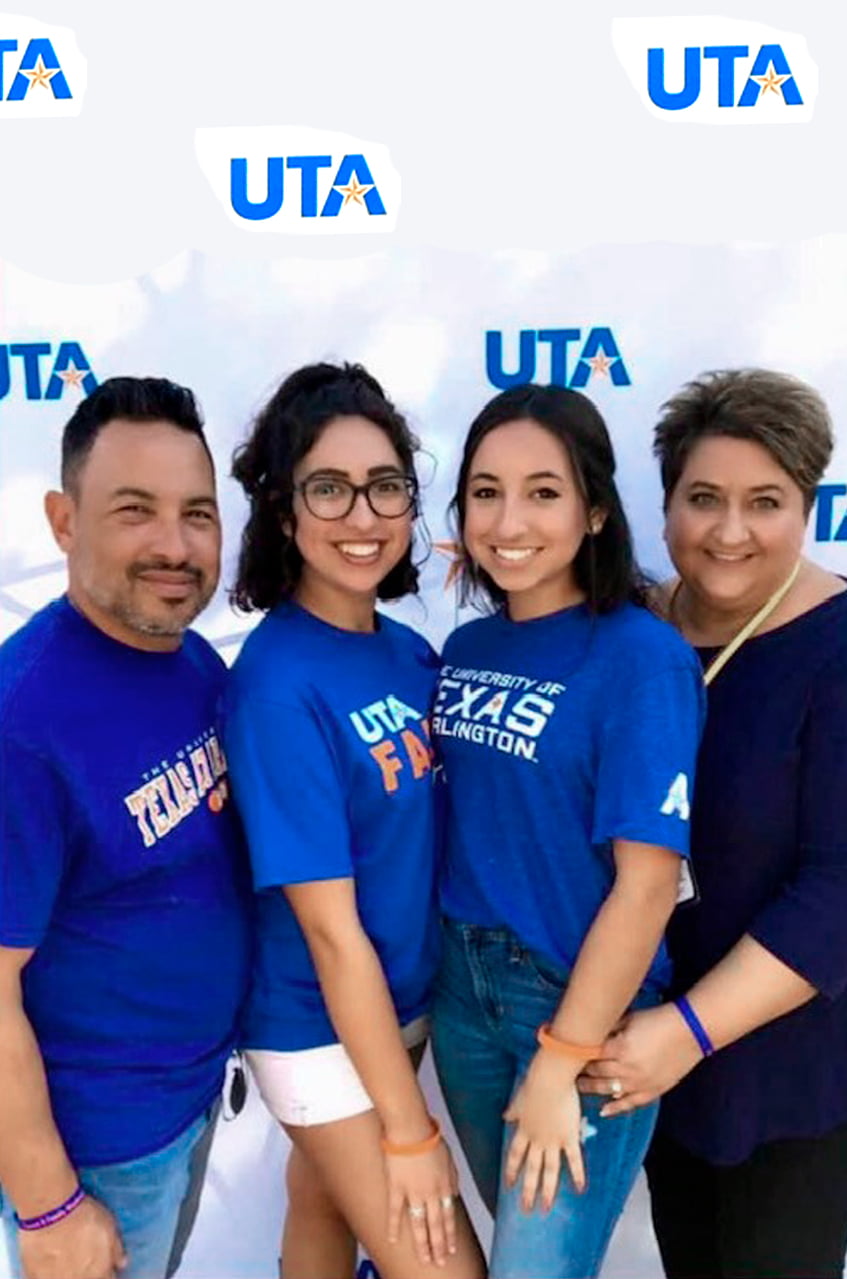 Two young women with their mom and dad.