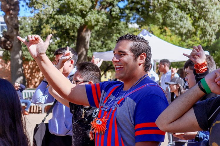 A UTA wrangler, apart of a student spirit group, "Mavs Up" at UTA