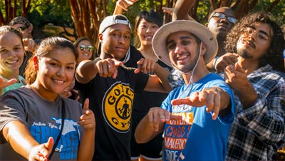 Members of an organization pointing towards you
