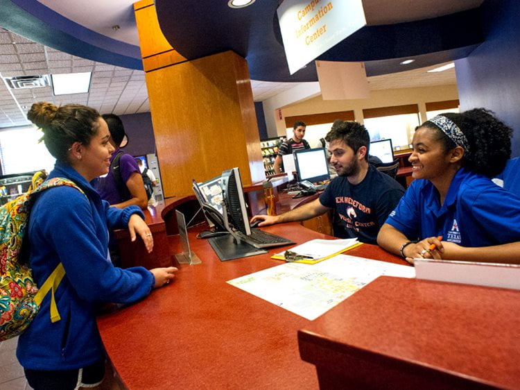 Student getting help from the OIT help desk in the UC