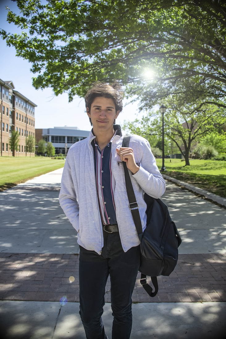 senior broadcast major at uta walking on campus