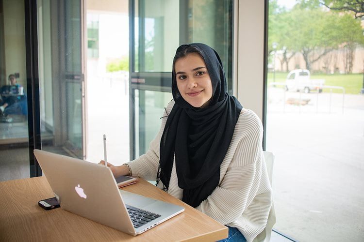 student studying in seir building in the uta campus.